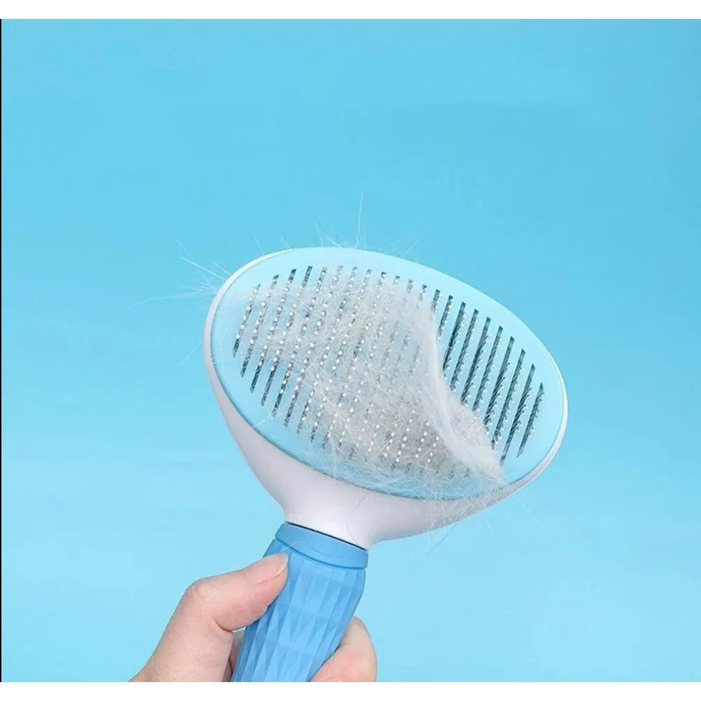 Stainless steel pet detangling comb in pink for long-haired dogs and cats