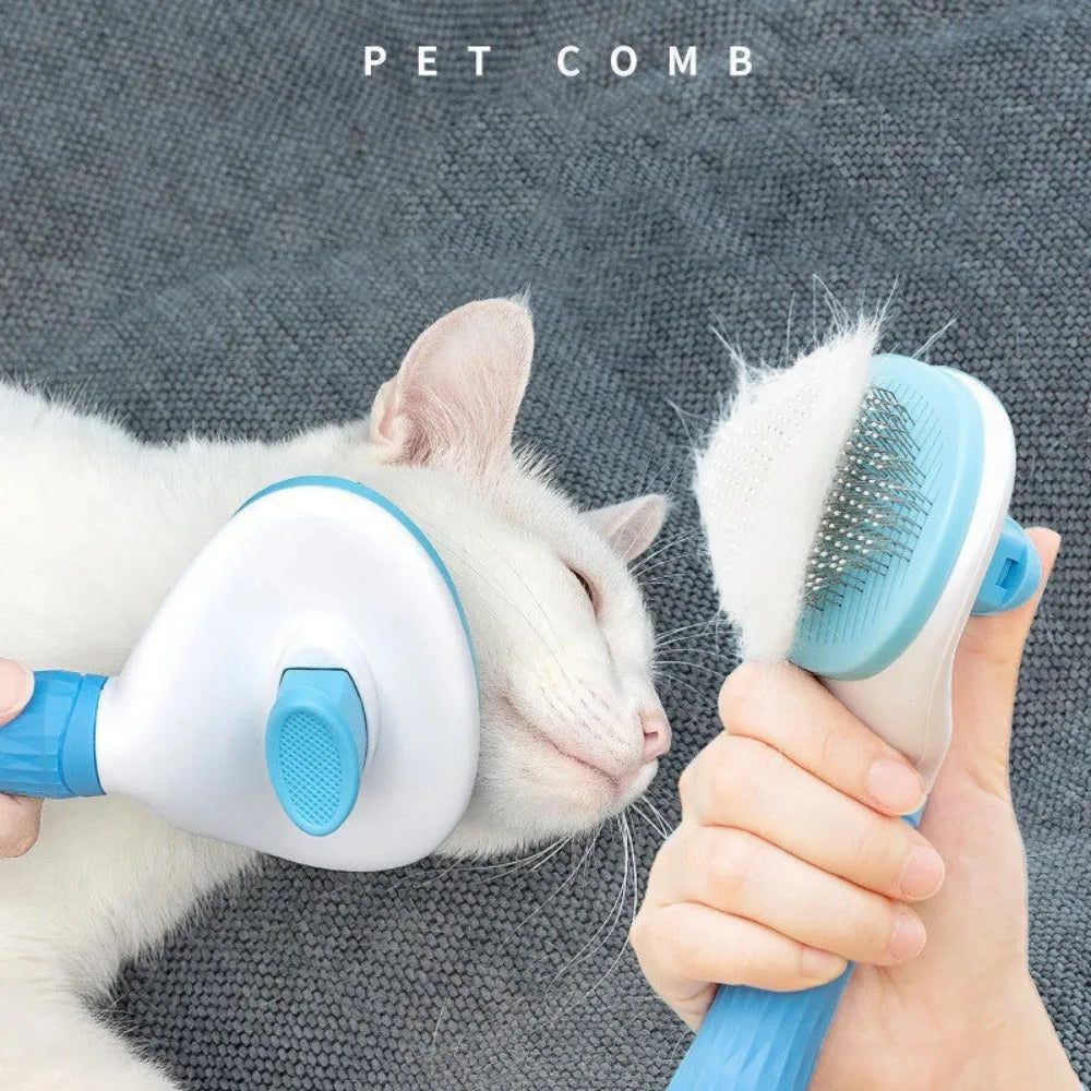 Stainless steel pet detangling comb in pink for long-haired dogs and cats