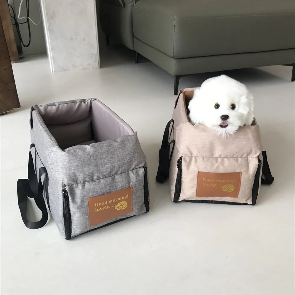 Khaki dog car seat on centre console armrest