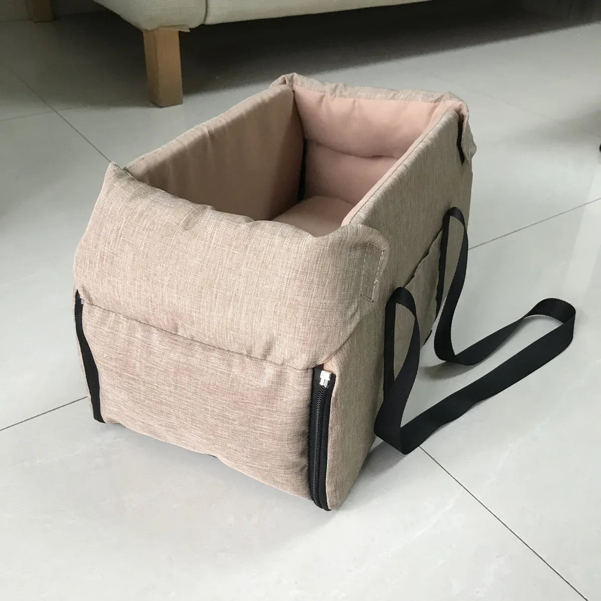 Console booster seat fitting on car centre armrest
