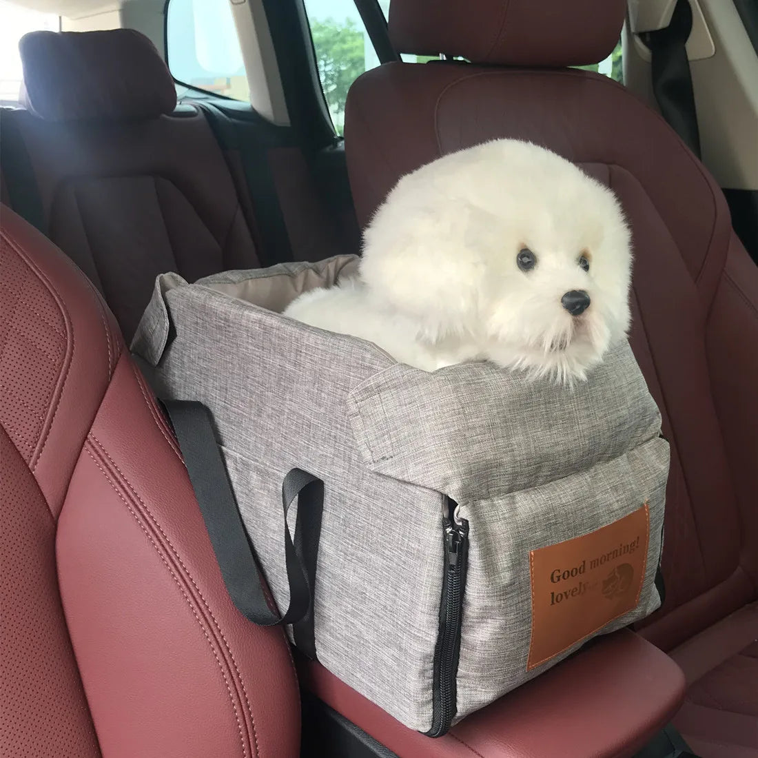 Console booster pet carrier zipped closed for travel