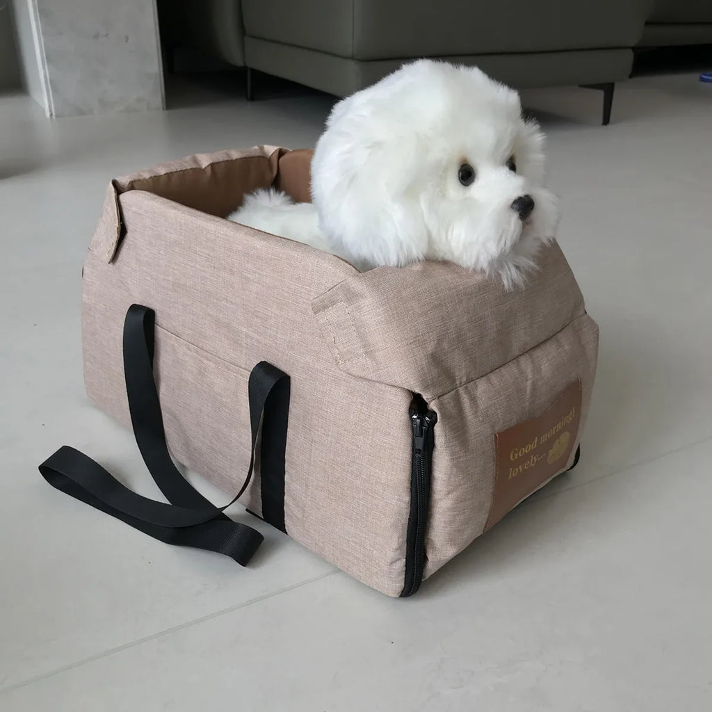 Small dog elevated in console booster car seat