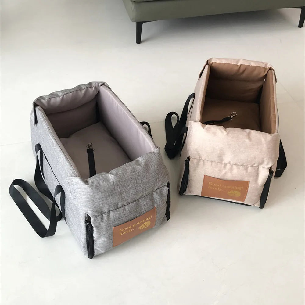Grey console booster dog seat open and ready for pet